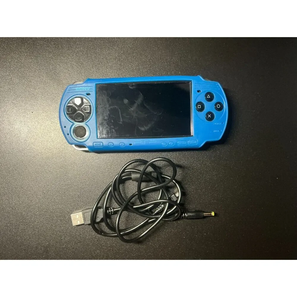Sony PSP-3001 Bundle w/ New Battery, Sony 1GB Memory Stick, Charger & Game